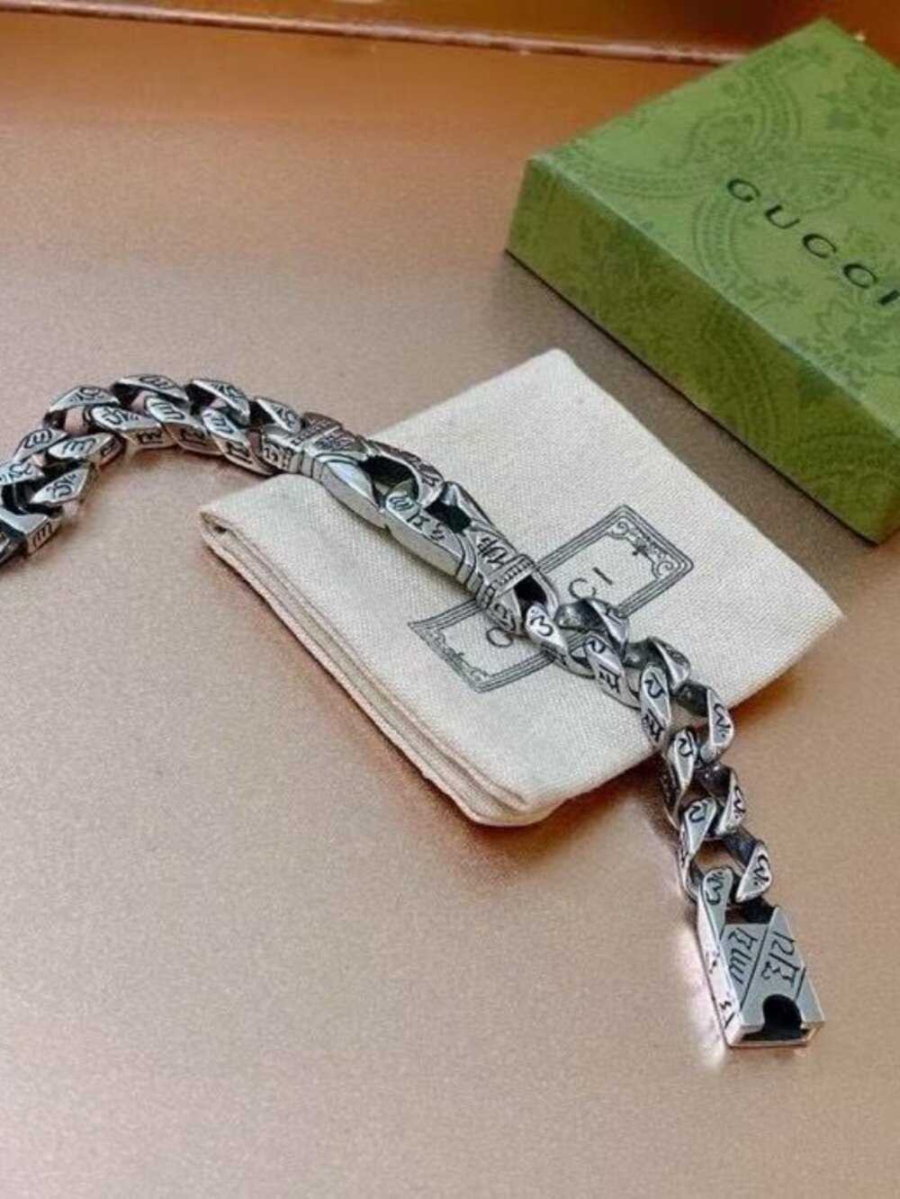 Gucci Antique Silver-Tone Engraved Cuban Link Bracelet